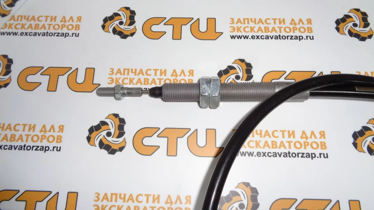 Трос VOE15635082 стояночного тормоза (ручника) экскаватора погрузчика Volvo BL61, BL71