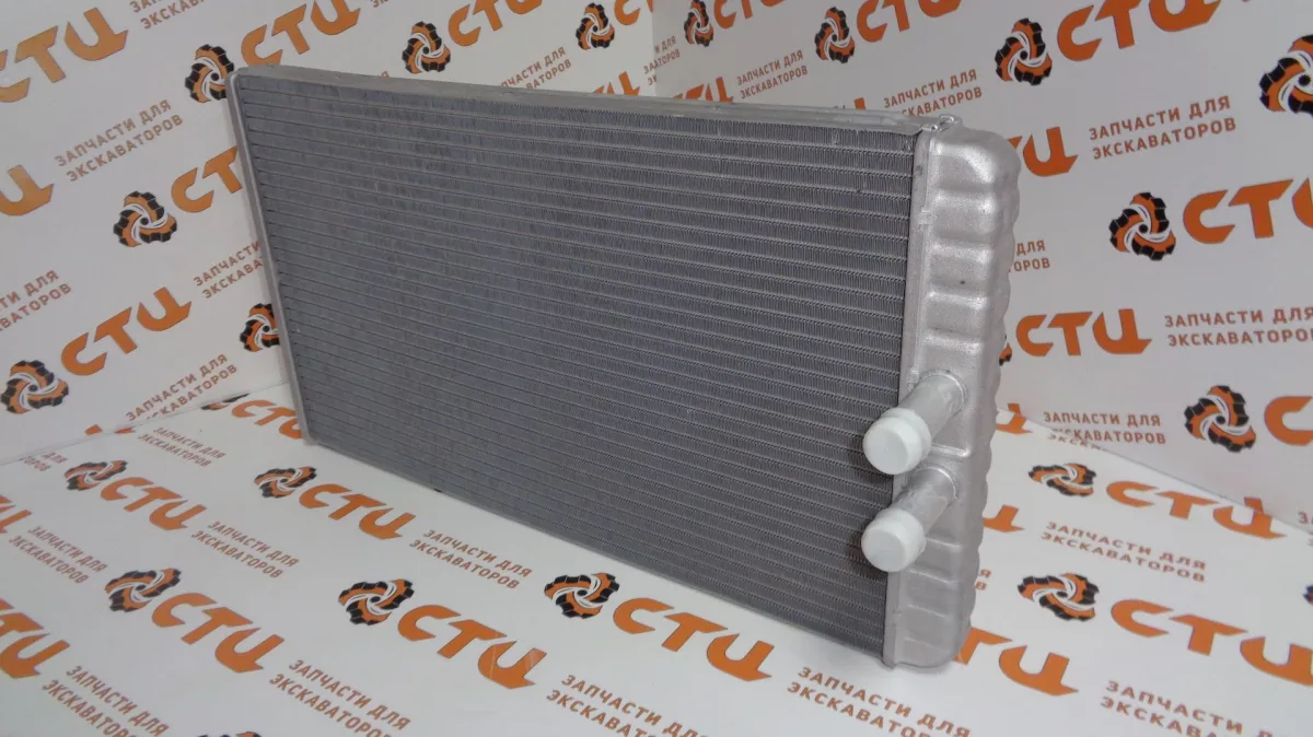 Радиатор печки (отопителя) VOE17228562 экскаватора погрузчика Volvo BL61, BL71