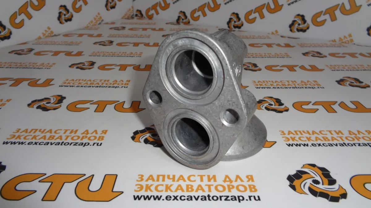 Голова (корпус) фильтра КПП T177997 экскаватора погрузчика John Deere 315SK, 325J, 325K