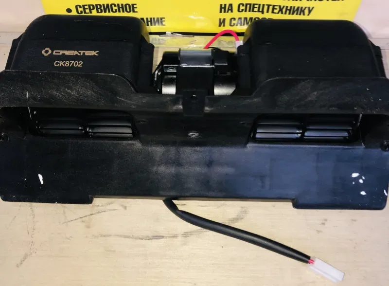 Мотор отопителя HOWO A5/A7, SITRAK T7H (24v/40W в сборе с двумя крыльчатками) CREATEK