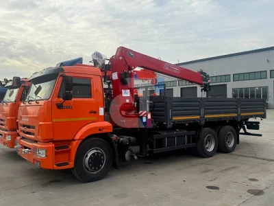 Бортовой КАМАЗ 65115 с КМУ HORYONG HRS 216