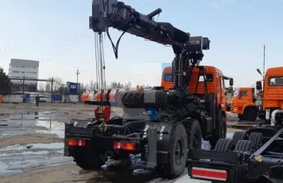 Седельный тягач Камаз 43118-48 с КМУ HORYONG HRS 216 с буром