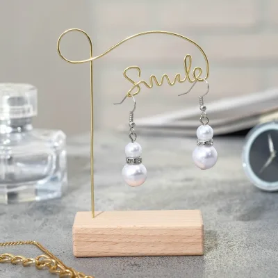 Подставка под серьги "Улыбка", цвет золотой, 60х105 мм